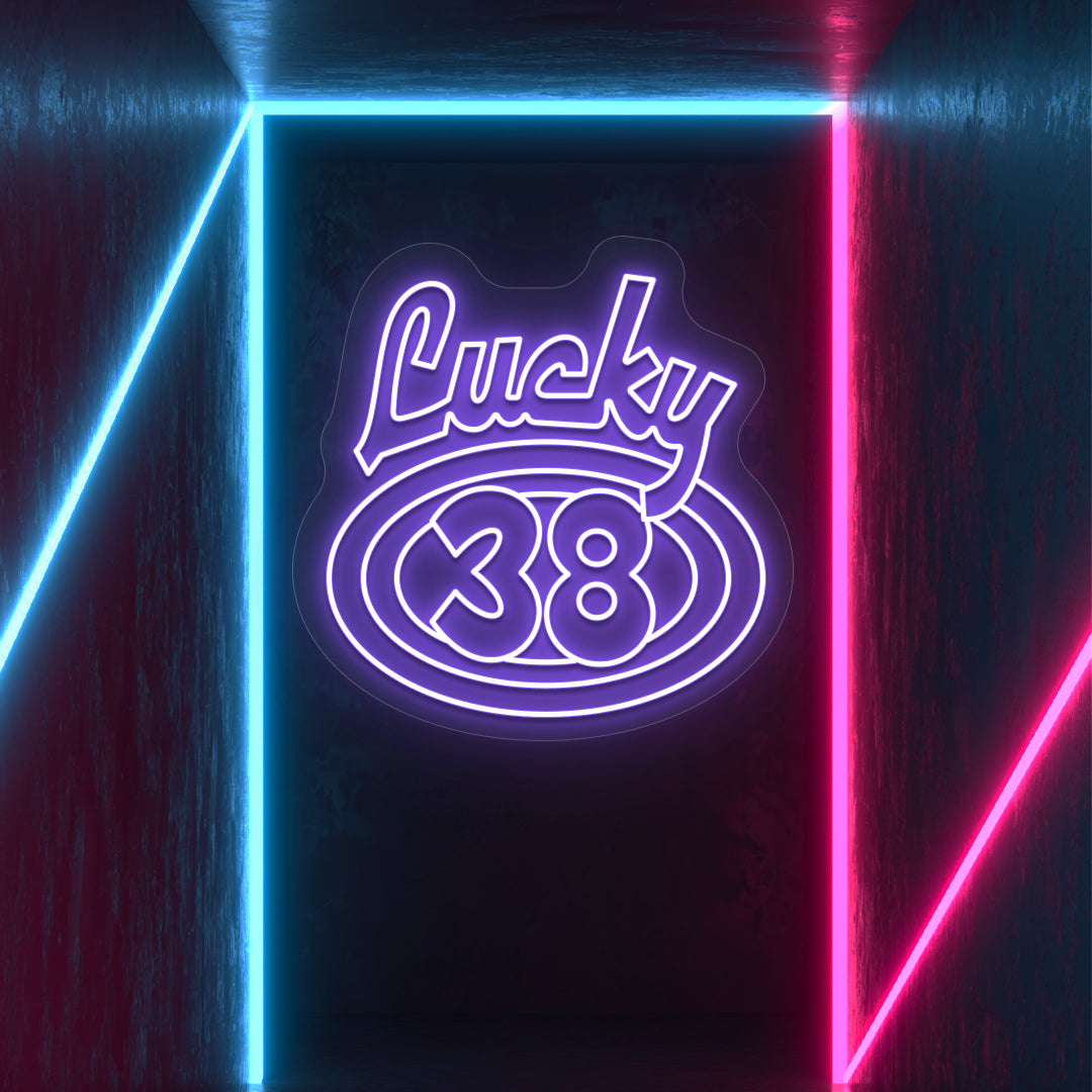 purple the lucky 38 vintage neon sign mounted on a wall