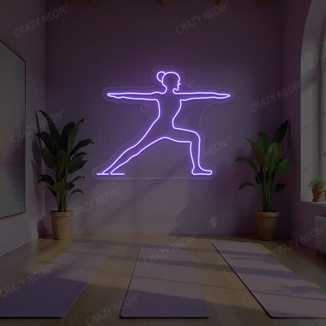 Virabhadrasana II Yoga Neon Sign lighting up in purple color in a yoga room