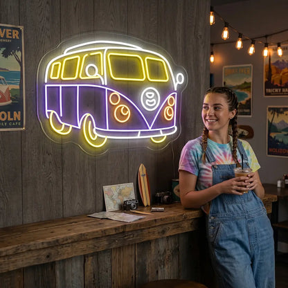 yellow purple and white camper van vintage neon sign mounted on a wall