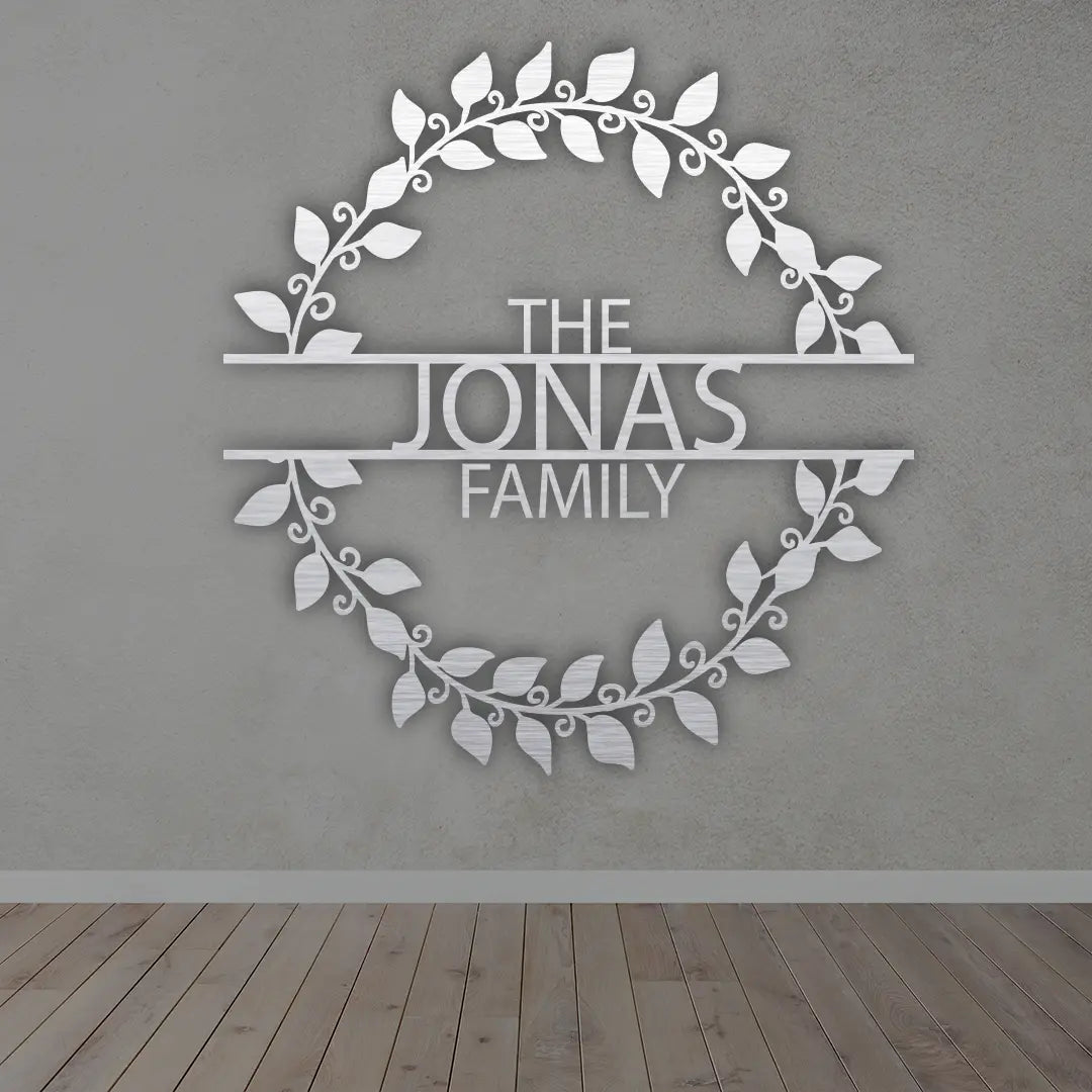 Metal Last Name Sign For Home in Silver colour mounted on wall 