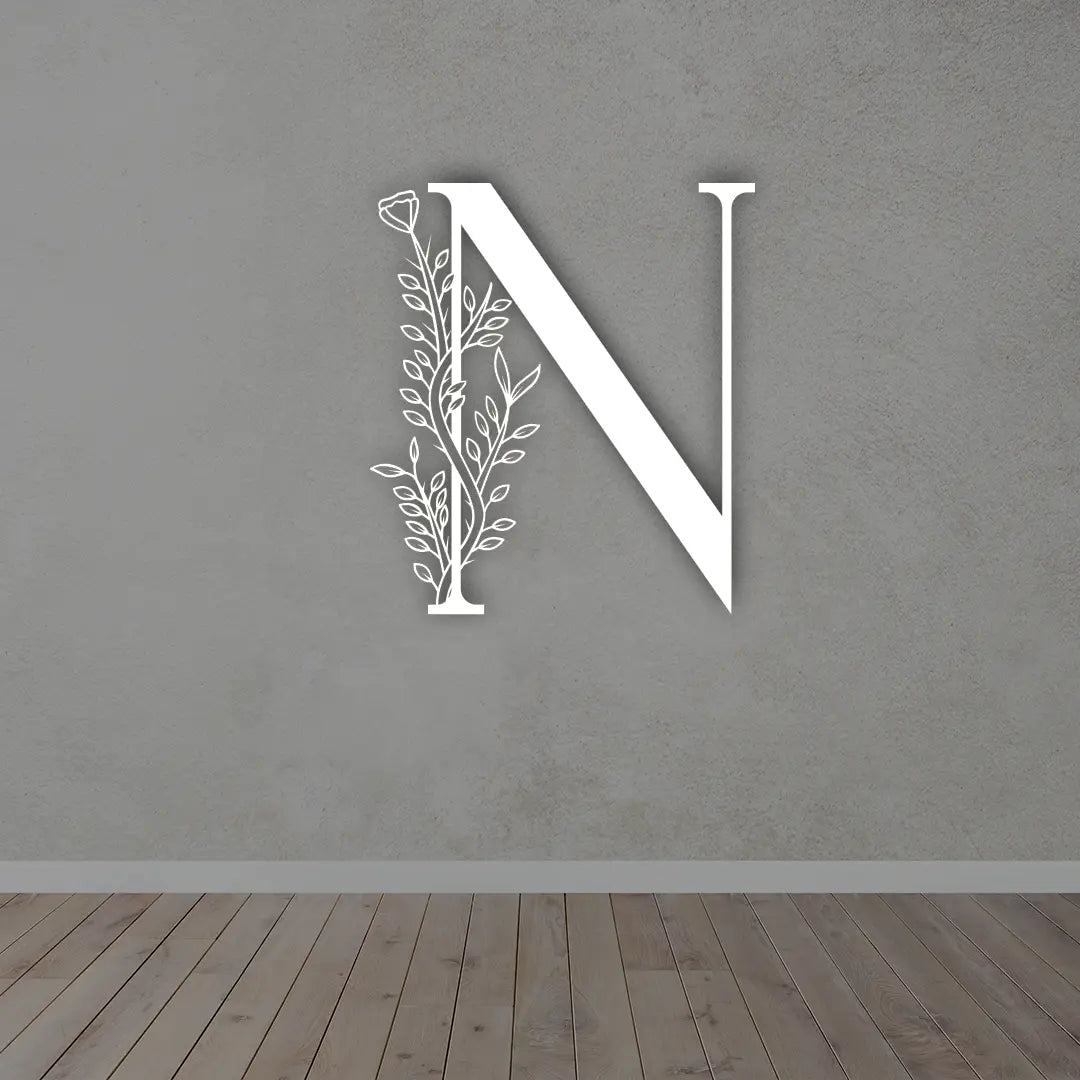 Metal Initial Sign in White colour mounted on wall 
