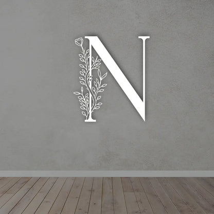 Metal Initial Sign in White colour mounted on wall 