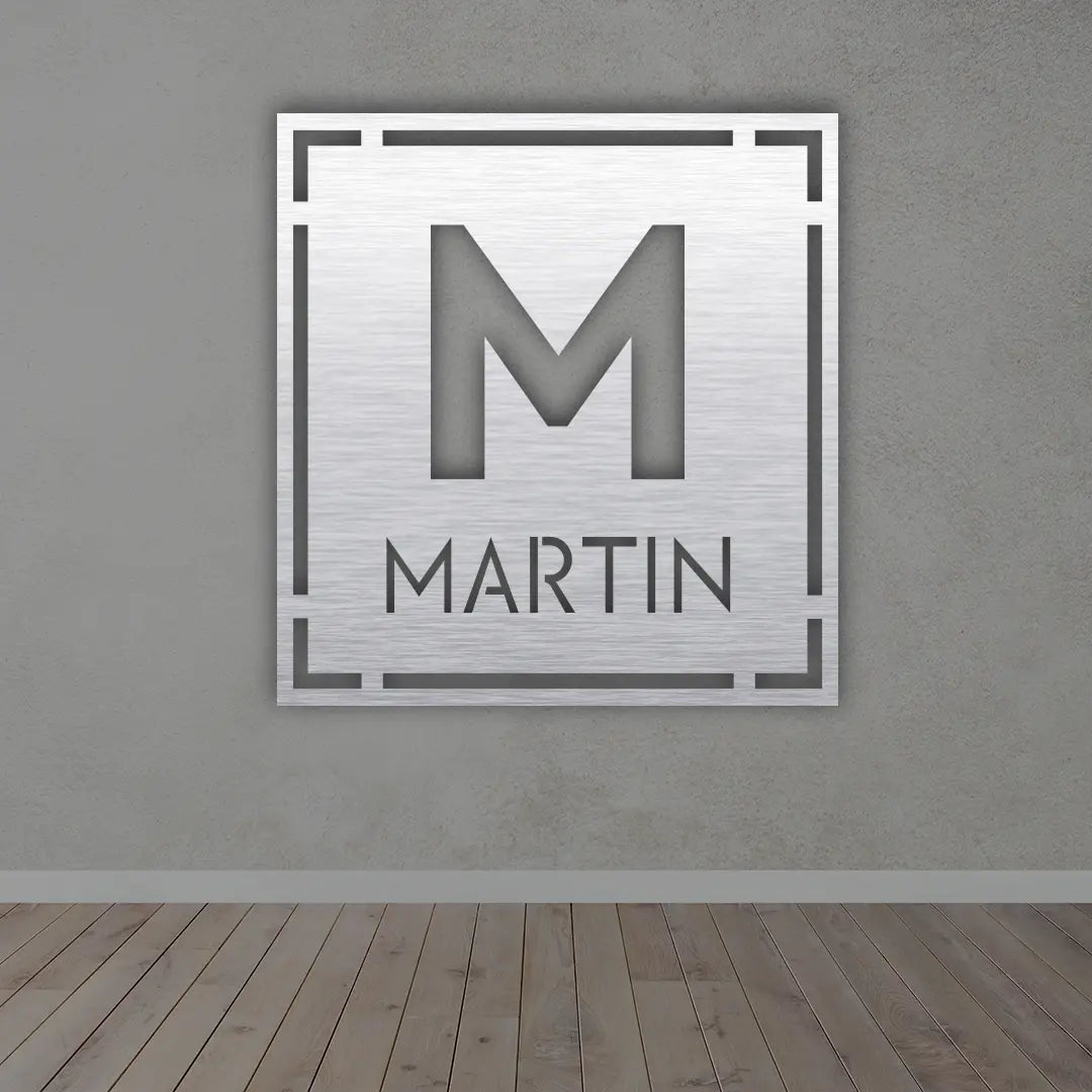 Personalized Last Name Metal Sign in Silver colour mounted on wall 
