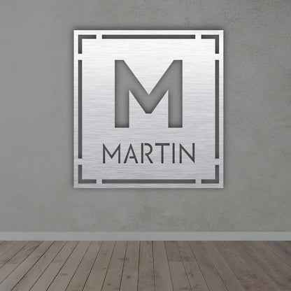 Personalized Last Name Metal Sign in Silver colour mounted on wall 