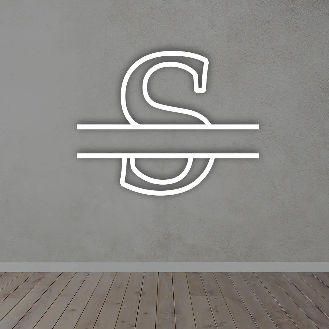 Split Letter Metal Monogram sign in white colour mounted on a wall