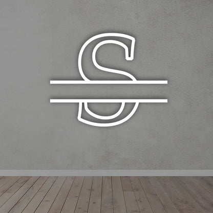 Split Letter Metal Monogram sign in white colour mounted on a wall