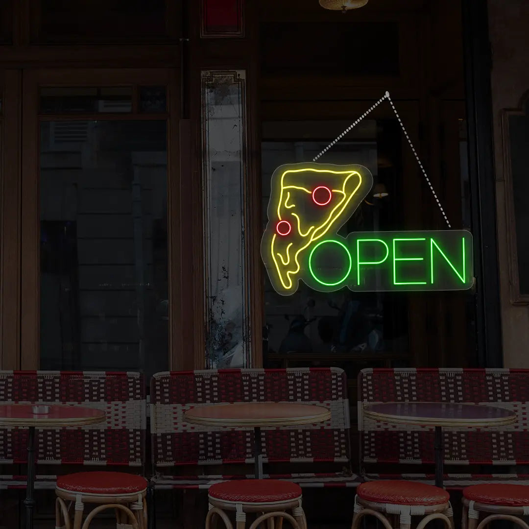 green pizza open neon sign hanging on a window
