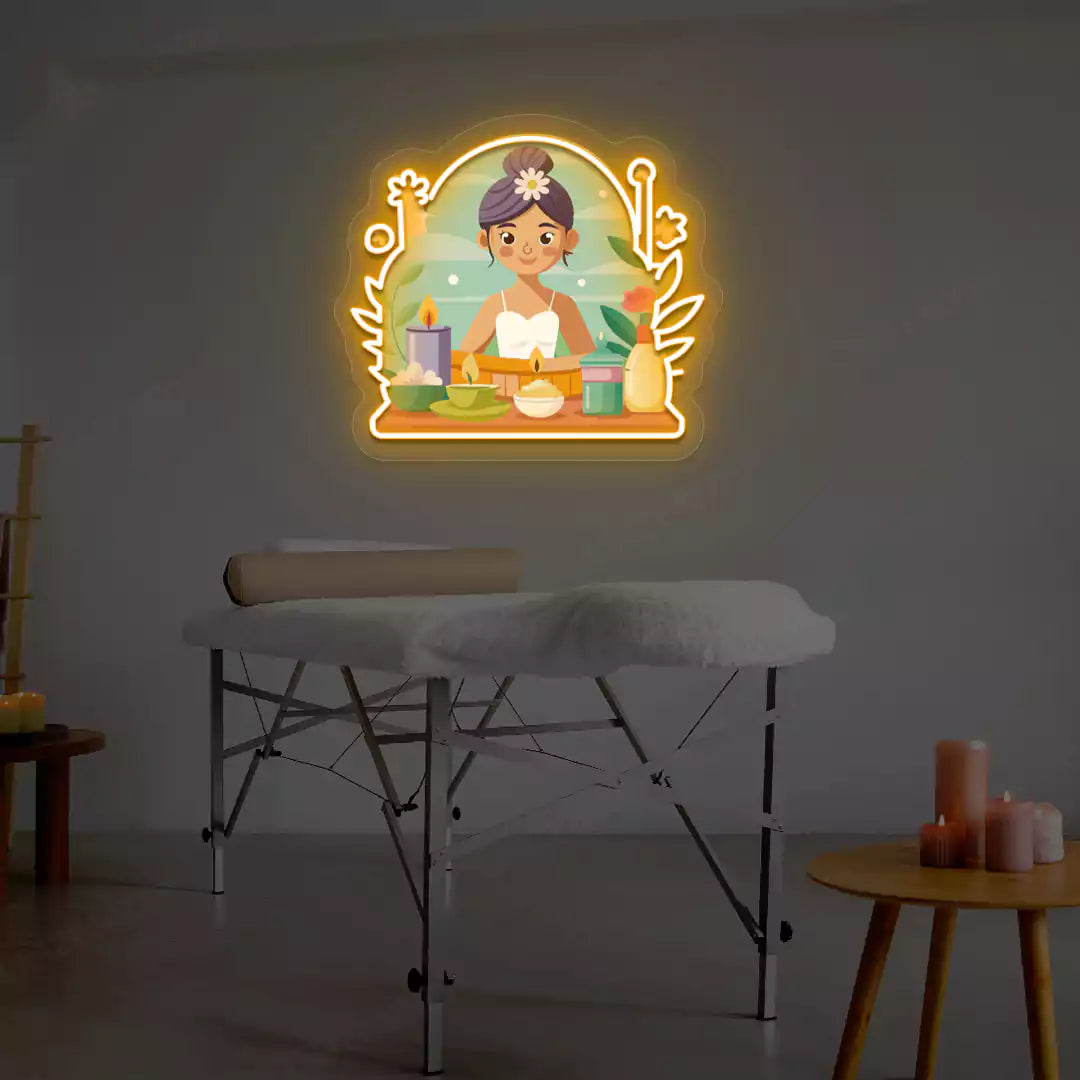 Spa Girl Neon Artwork lighting up in orange color on a spa wall