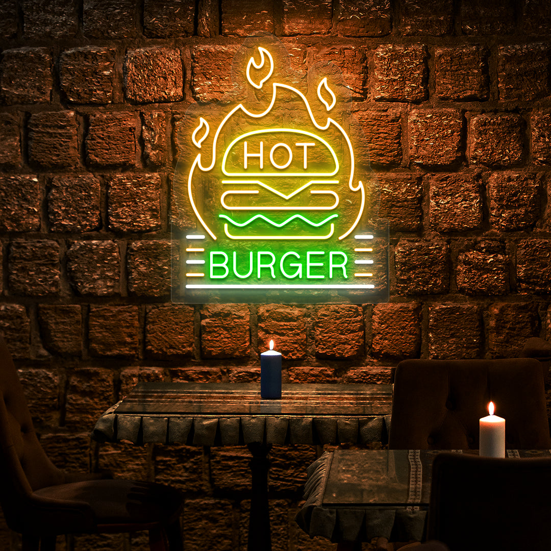 green yellow orange and white hot burger neon sign mounted on a wall
