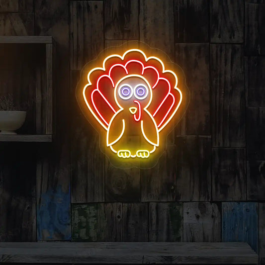 Vibrant thanksgiving turkey neon sign in orange and red.