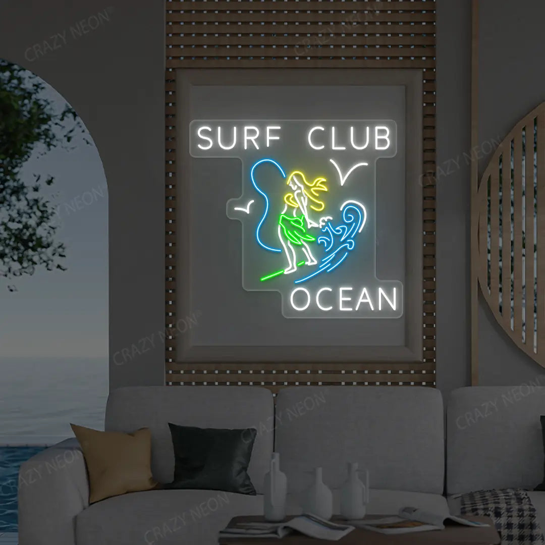 green surf club ocean neon sign mounted on a wall