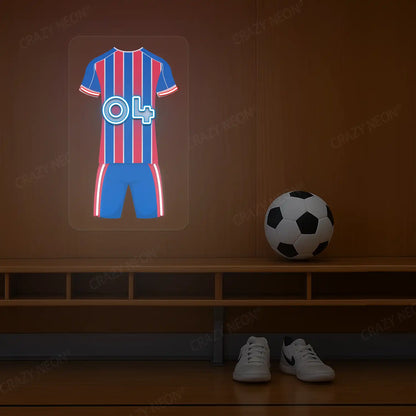 Red and blue striped football jersey neon artwork with number 04 glowing on a wooden wall