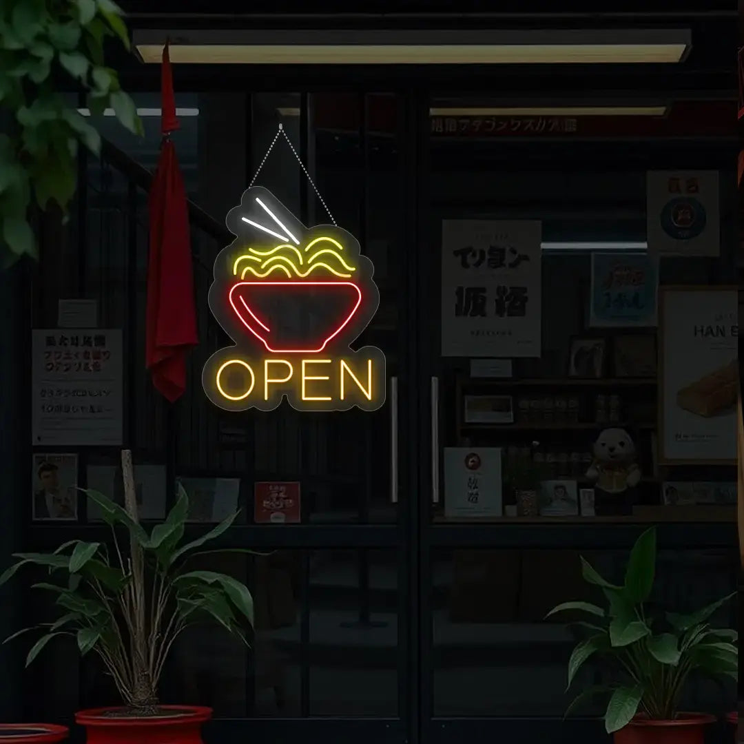 orange noodles open neon sign hanging on a window