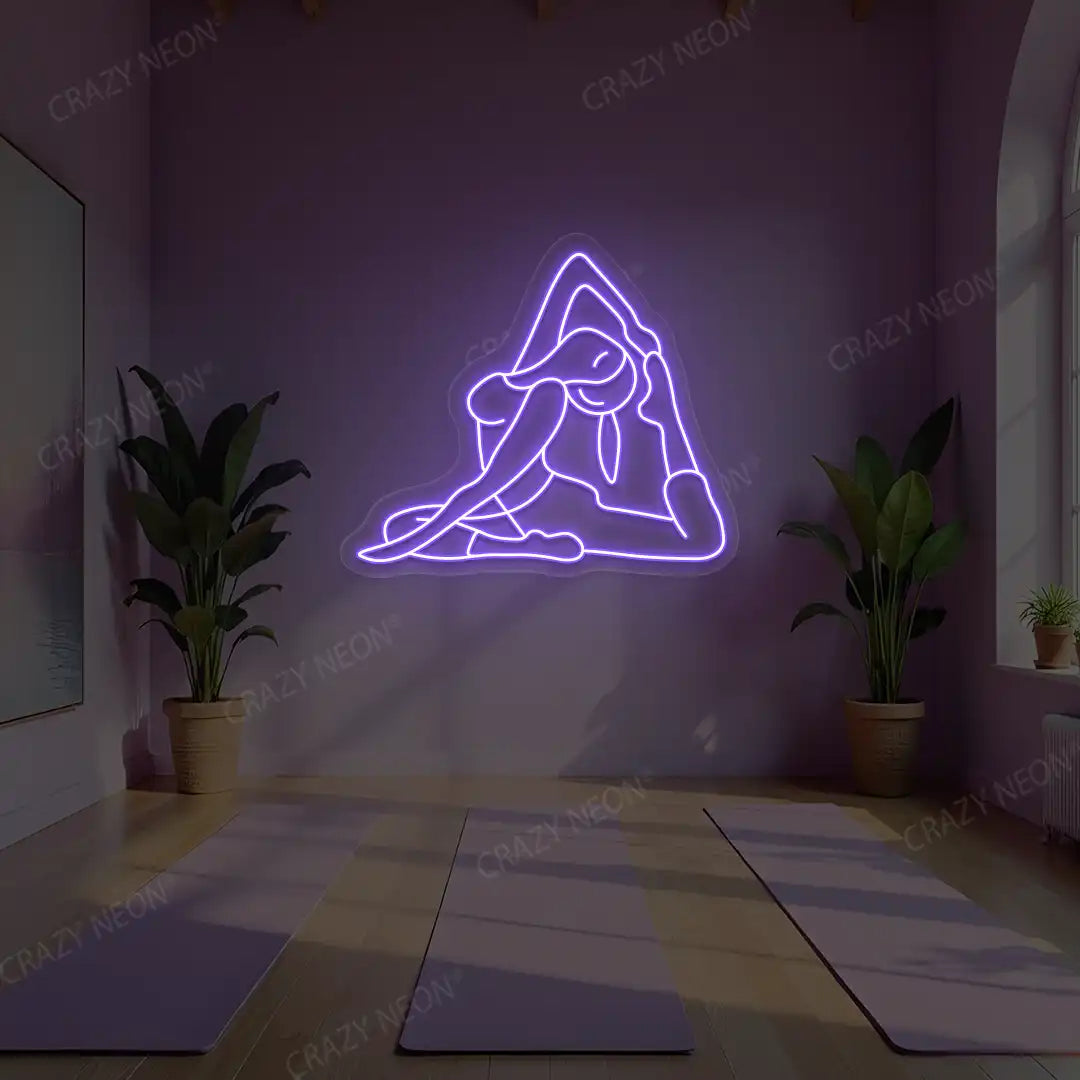 Eka Pada Rajakapotasana Yoga Neon Sign lighting up in purple color in a yoga room
