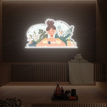 Aromatherapy Relaxation Neon Artwork lighting up in white color on a wooden spa wall