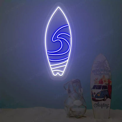 blue and white surfboard beach neon sign mounted on a wall
