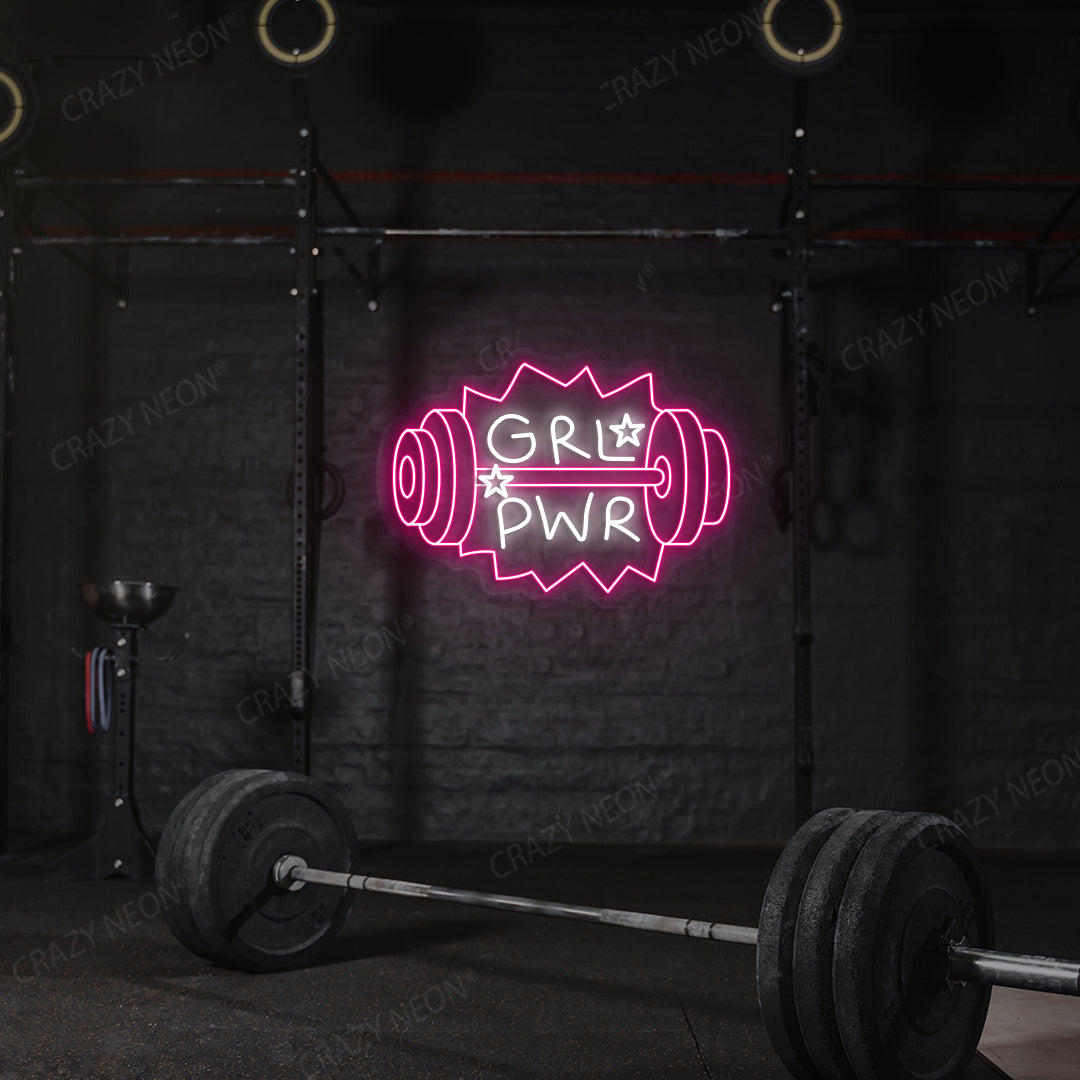 pink and white grl pwr gym neon sign mounted on a wall