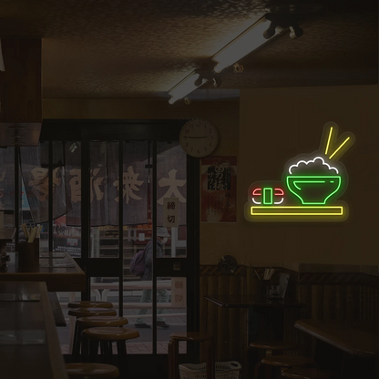 green and multi color sushi and rice bowl neon sign mounted on a wall