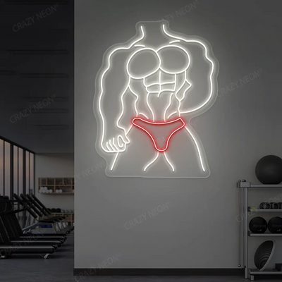 red and white physique pro neon sign mounted on a wall