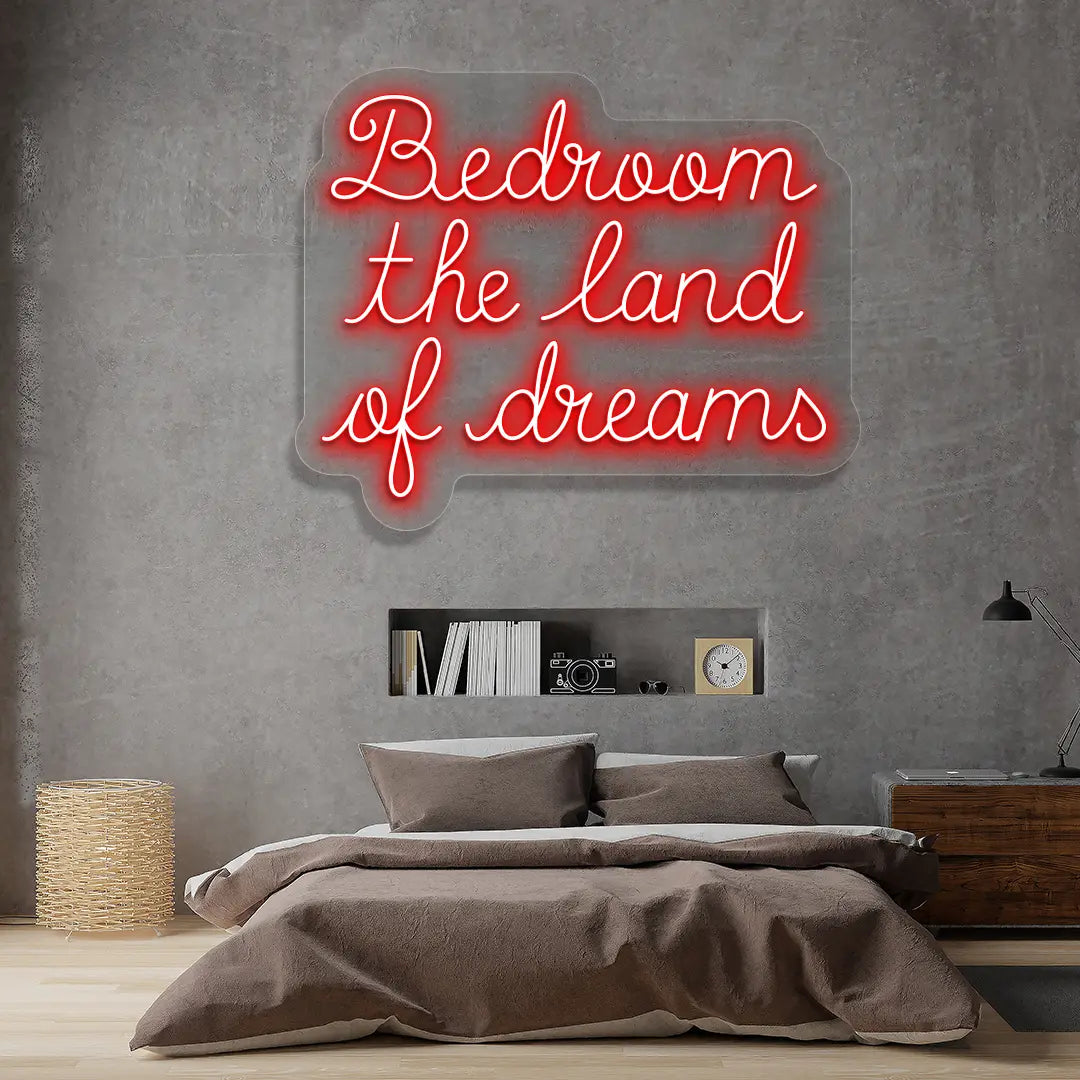 red bedroom the land of dreams neon sign mounted on a wall