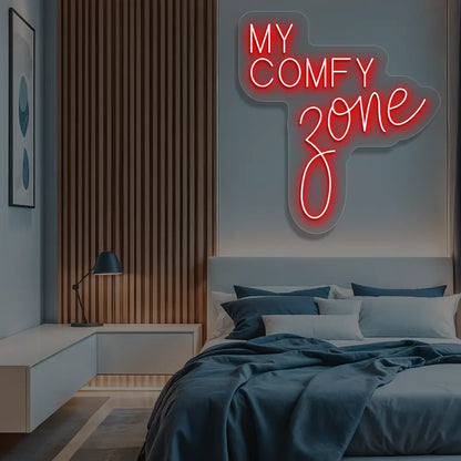 red my comfy zone neon sign mounted on a wall