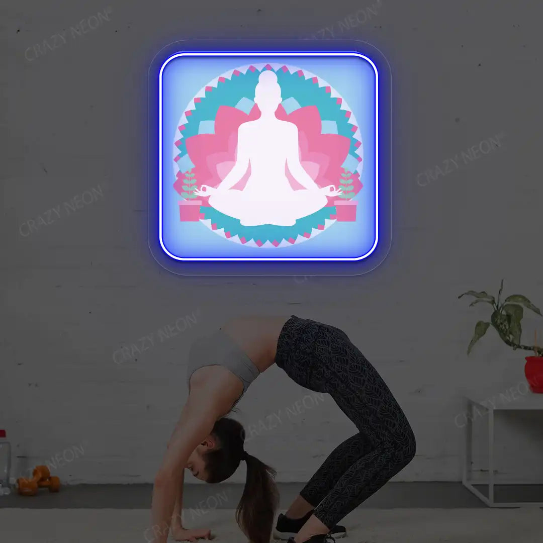 Padmasana Mandala Yoga Neon Artwork lighting up in blue color in a yoga room