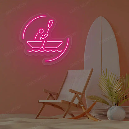 pink solo rowing boat neon sign mounted on a wall
