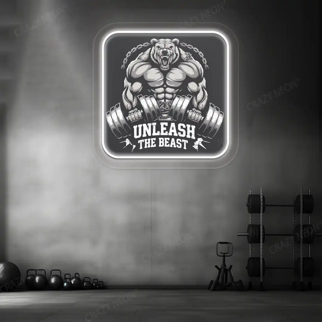 white unleash the beast bear neon artwork mounted on a wall