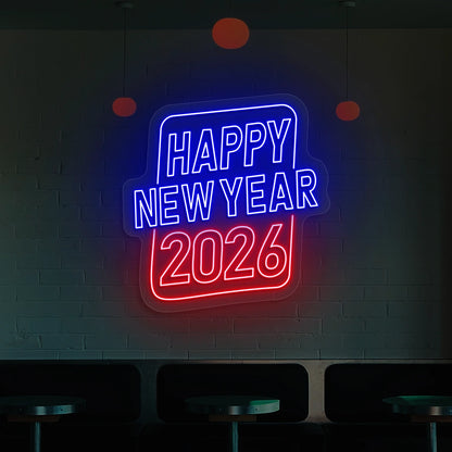 Neon sign reading Happy New Year 2026 in blue and red lights on a brick wall 