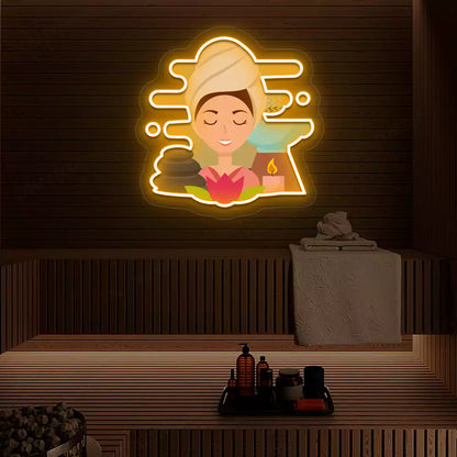 Steam Wellness Neon Artwork lighting up in orange color on a wooden spa wall