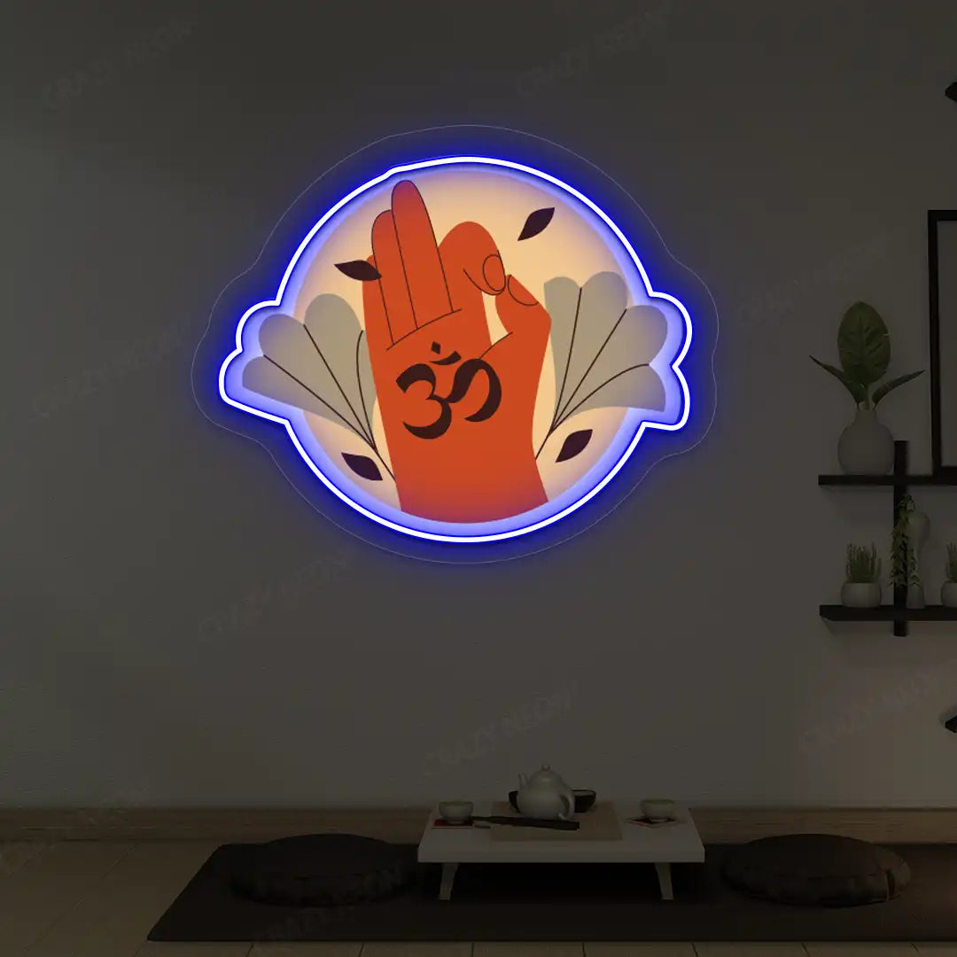 Om Gyan Mudra Neon Artwork lighting up in blue color in a yoga room