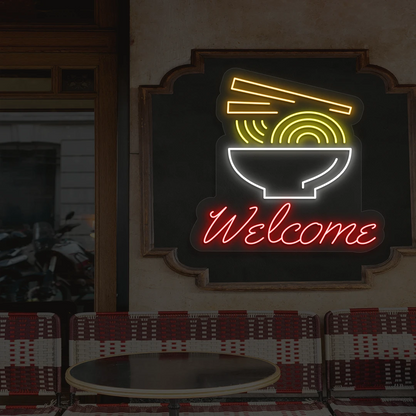 red white yellow and orange welcome noodle bowl neon sign mounted on a wall