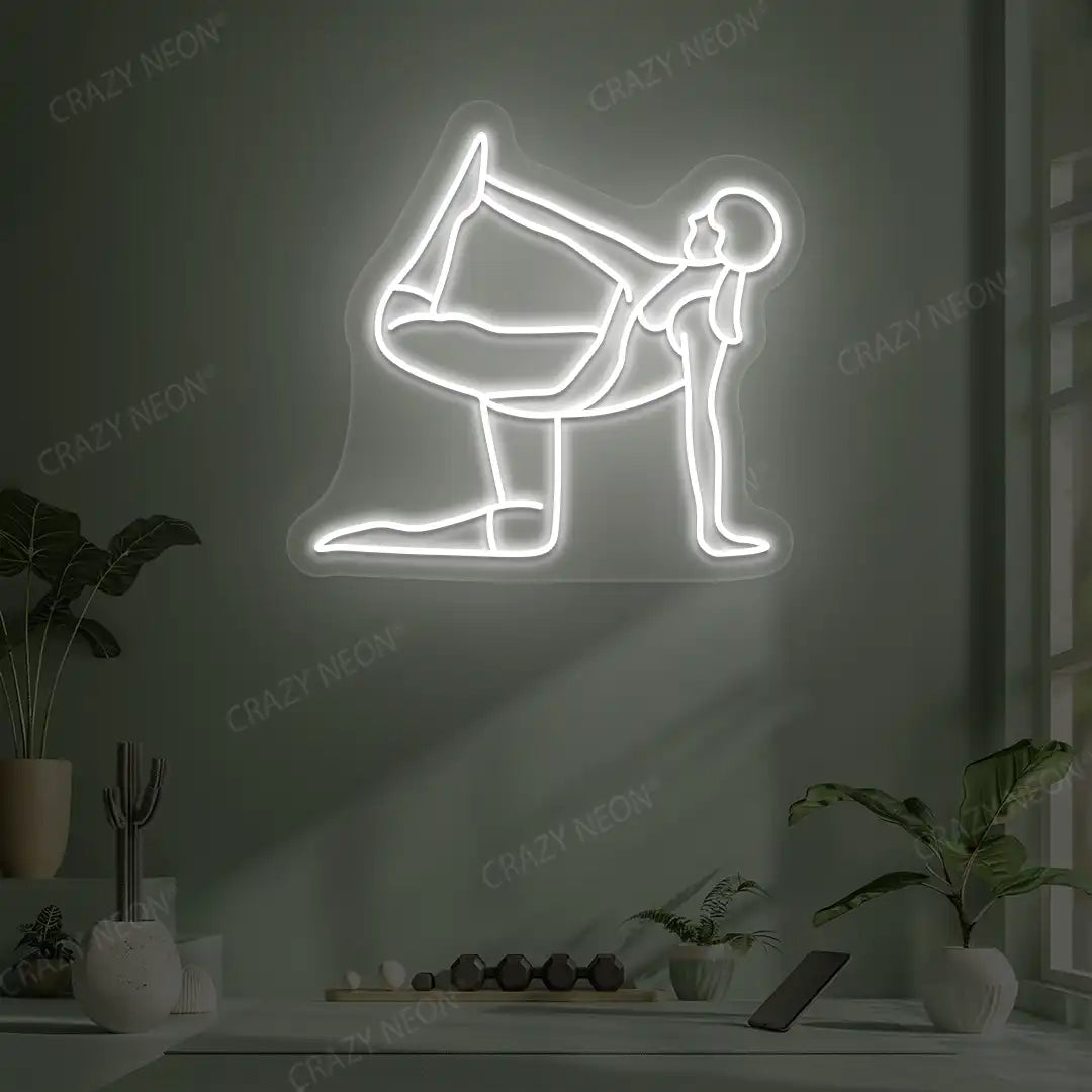 Ardha Dhanurasana Yoga Neon Sign glowing in white color in a yoga room