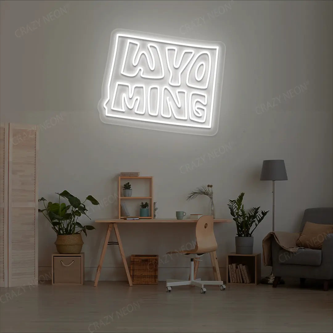 WYOMING Map Neon Sign lighting up in white color in a room
