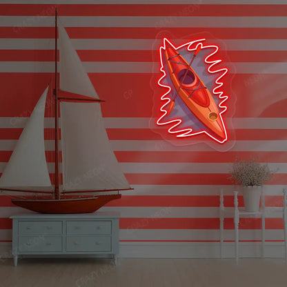 red floating kayak neon artwork mounted on a wall