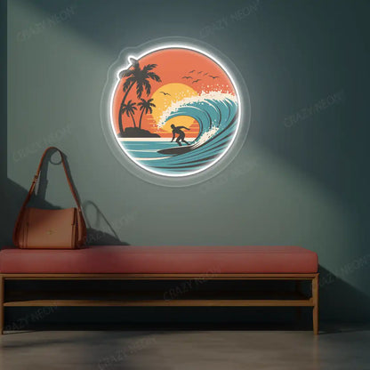 white sunset surfer riding wave neon artwork mounted on a wall