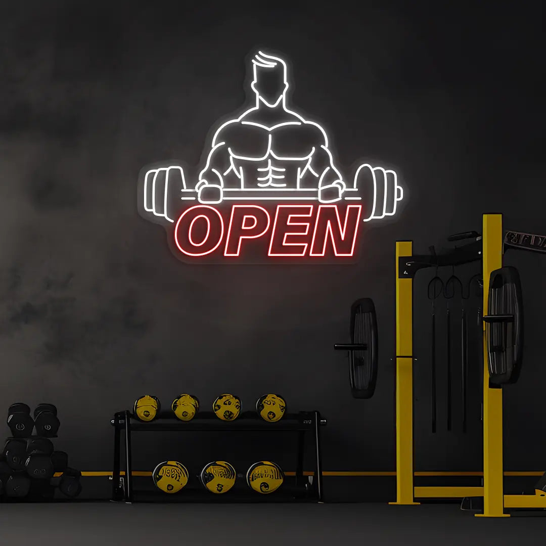 red and white open gym bodybuilder neon sign mounted on a wall
