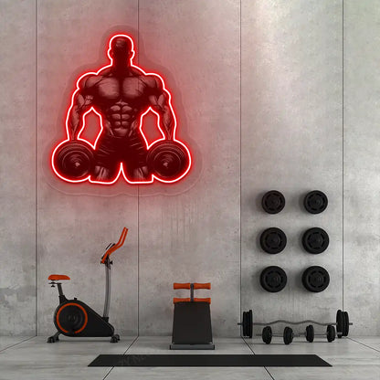 red muscle man dumbbell gym neon artwork mounted on a wall