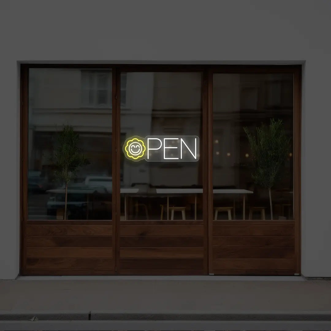 yellow flower open neon sign hanging on a window