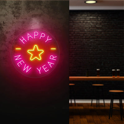 Round Happy New Year neon sign with pink and yellow star design glowing on a dark wall