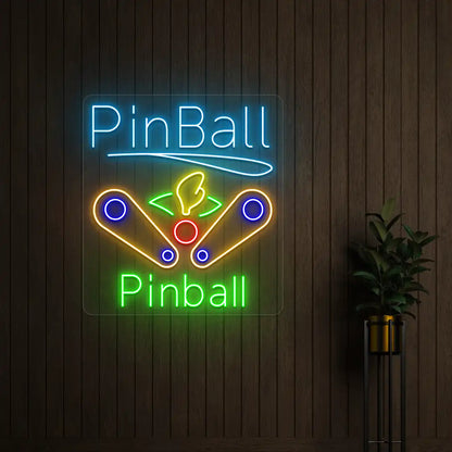 Multi color pinball wizard vintage neon sign mounted on a wall