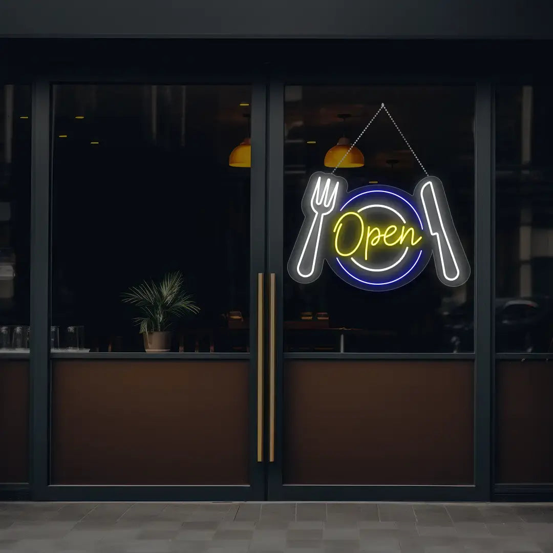 yellow diner open neon sign hanging on a window