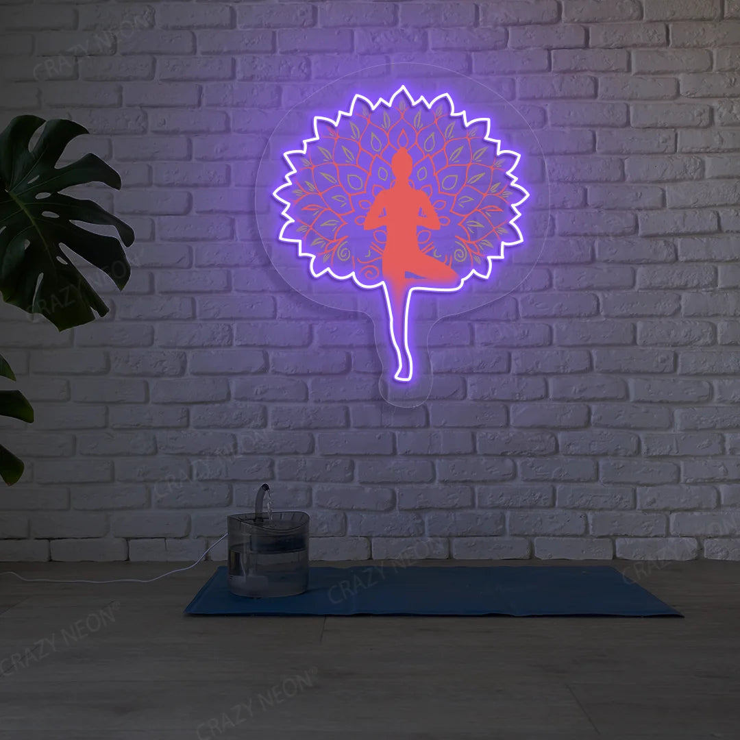 Mandala Yogi Harmony Tree Pose Yoga Neon Artwork lighting up in purple color in a yoga room