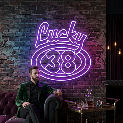 purple the lucky 38 vintage neon sign mounted on a wall
