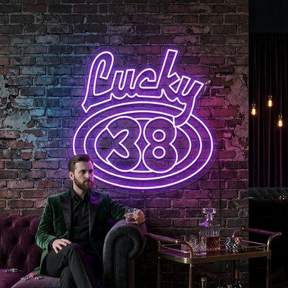 purple the lucky 38 vintage neon sign mounted on a wall