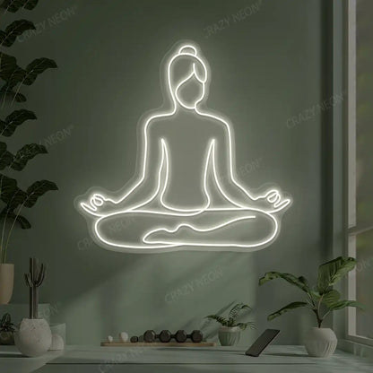 Swastikasana Contour Yoga Neon Sign lighting up in warm white color in a yoga room