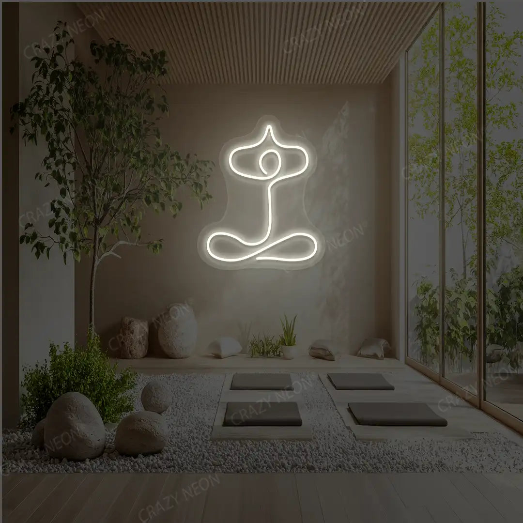 Sukhasana With Arms Raised Contour Yoga Neon Sign glowing in white color in a yoga room