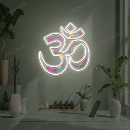 Psychedelic OM Neon Artwork lighting up in warm white color in a yoga room