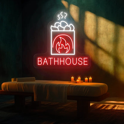 FireStone Bathhouse neon sign in red and white colors glowing in a spa room