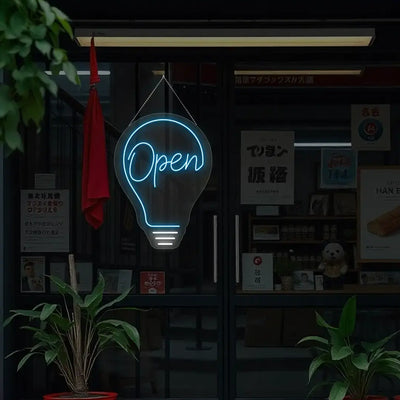 ice blue bulb open neon sign hanging on a window